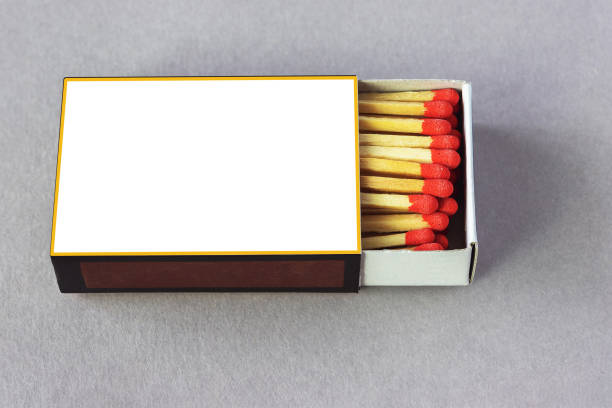 istock Matchbox with red matchheads on gray background 2164332734