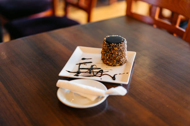 A chocolate dessert on the table in a pub.