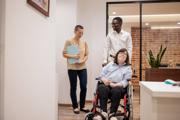 istock Business professionals working together in an office 2164335533