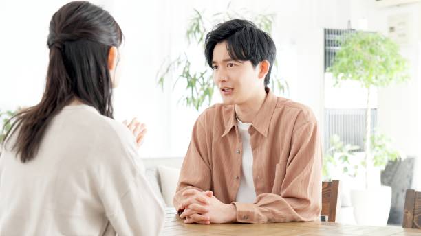 istock Couple having a serious conversation in the living room 2164335633