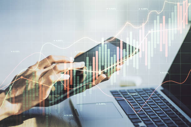 istock Multi exposure of abstract creative financial graph with finger presses on a digital tablet on background, forex and investment concept 2164335682