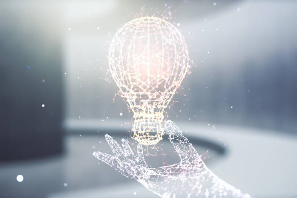 istock Abstract virtual light bulb hologram on empty classroom background, idea concept. Multiexposure 2164335838
