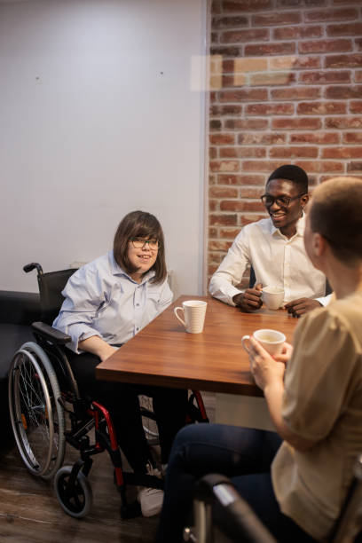 istock Coworkers talking in the office 2164337751