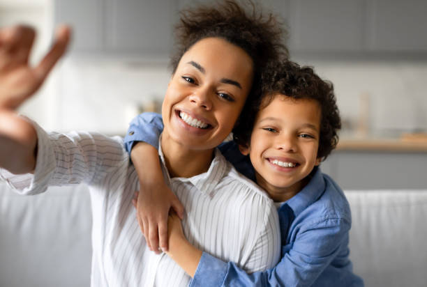 istock Mother and son taking a selfie together 2164339200