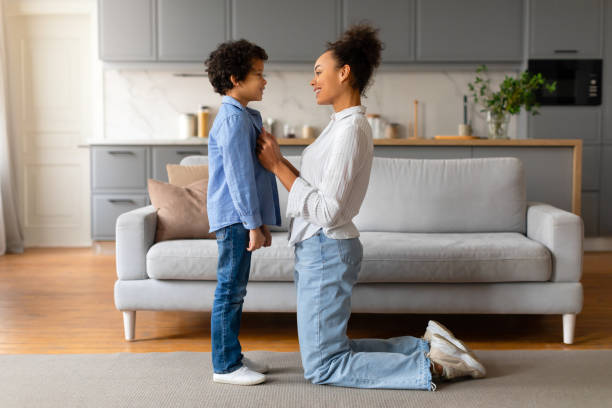 istock Mother and son bonding in modern home 2164339215