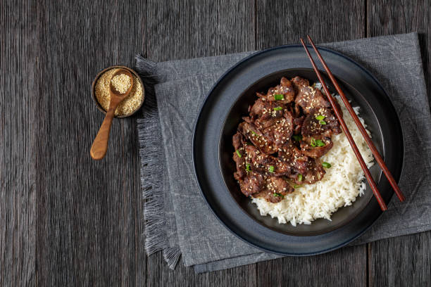 istock Bulgogi, Korean BBQ Beef with rice, top view 2164339476