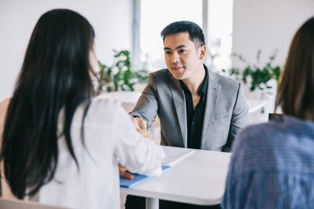 istock Business candidate shaking hands with HR manager 2164344242