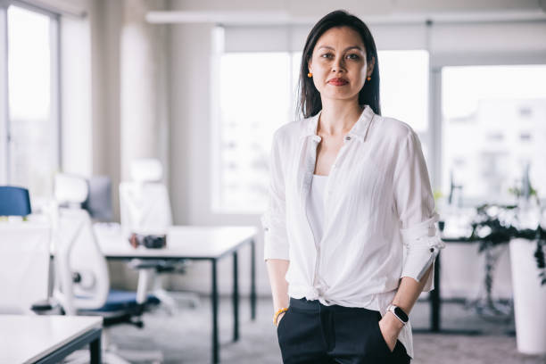 istock Confident female CEO at the office 2164345789