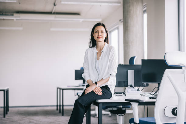 istock Confident female CEO at the office 2164345802