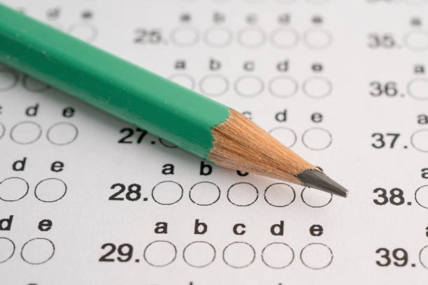 istock Answer sheets with pencil drawing fill to select choice education. 2164346300