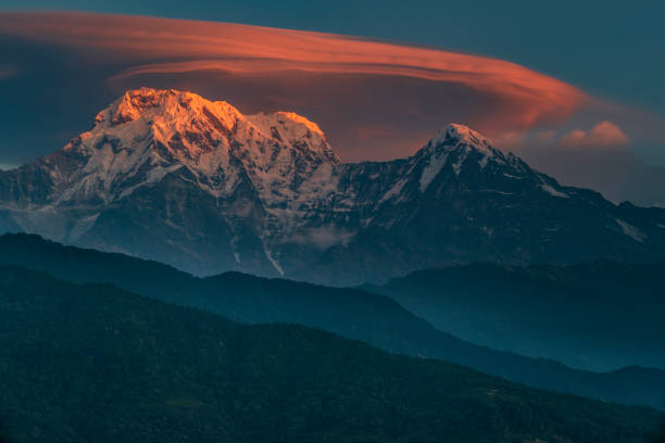 Sunrise over Annapurna range, Himalayas. The Annapurna region is in western Nepal where some of the most popular treks (Annapurna Sanctuary Trek, Annapurna Circuit) are located. Peaks in the Annapurnas include 8,091m Annapurna I, Nilgiri and Machhapuchchhre. The Annapurna peaks are among the world's most dangerous mountains to climb.