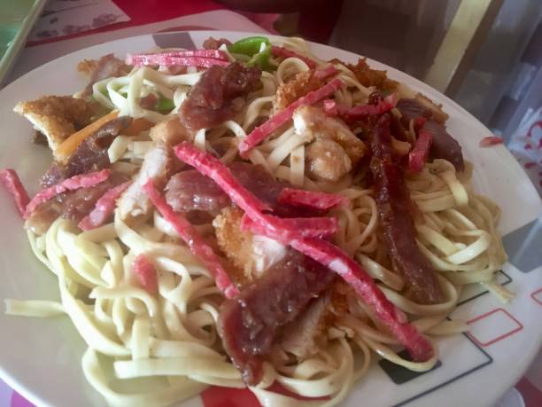 istock Noodles with Meat Strips and Fried Egg 2164350249