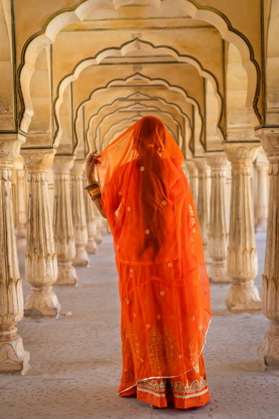 istock Young Indian woman posing in Jaipur 2164354393