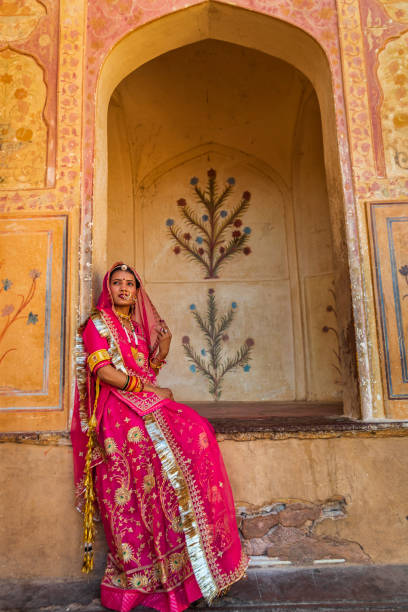 istock Young Indian woman posing in Jaipur, India 2164354559