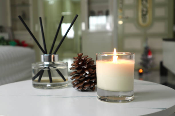istock luxury scented candles on the nice table in white bedroom creating relax ambient 2164356733