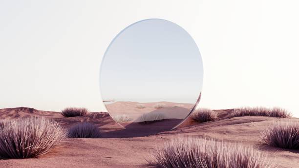 istock 3D rendering of an abstract desert landscape with mirrored geometric objects. 2164357375