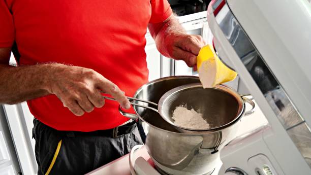Me sifting flour for a batch of home made bread