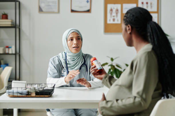 istock Consulting patient about new pills 2164367773