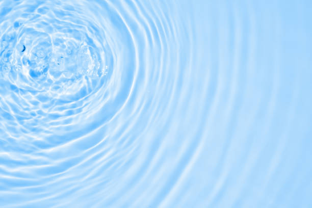 istock Abstract transparent water shadow surface texture natural ripple on blue background 2164371087