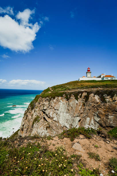 istock Cliffs Underneath Lighthouse Of Cape Roca, Portugal 2164371190