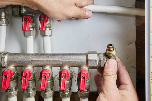 istock Repairing manifold with shut-off valves on home water supply system distribution. 2164373584
