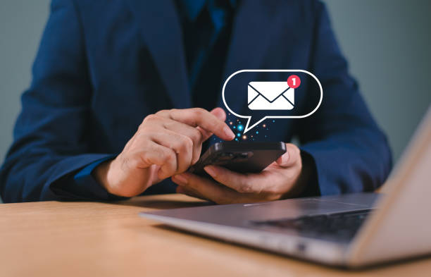 istock Email campaign alert concept. New email send notification for business e-mail communication. Digital marketing, internet technology. Inbox receives electronic message invite. Man touch on newsletter. 2164381581