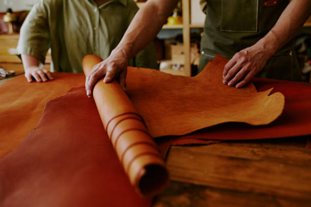 istock Unrecognizable Male Hands Rolling Out Chocolate Fabric 2164386900