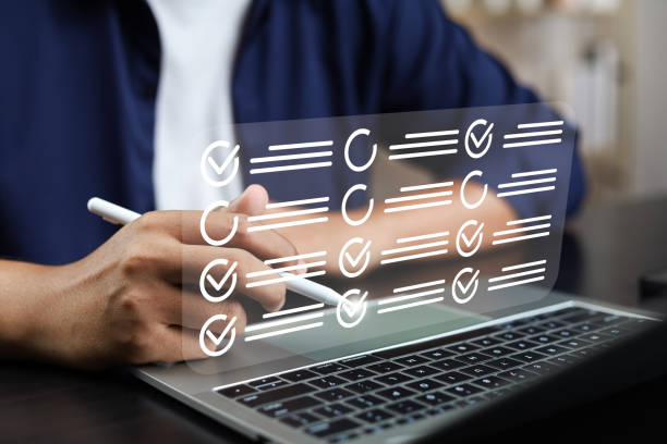 istock Digital Checklists for efficient business management, Businessman touching marking on checklist guide to paperless assessment and Future Success, Streamlining operations with online surveys. 2164390013