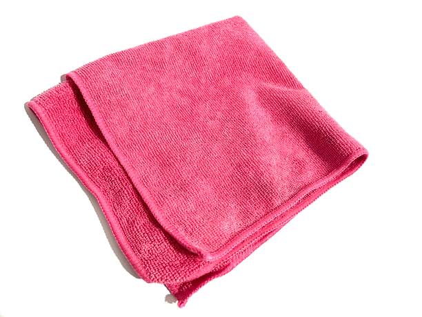 istock Pink folded towel isolated on white background 2164393530