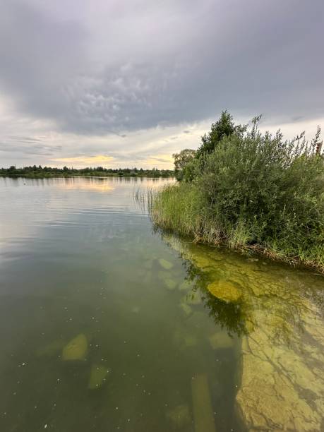 istock lake clear calm water Jurmala Latvia 2164394450