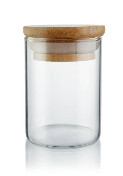 istock Kitchen jar with wood lid isolated on white. 2164399596