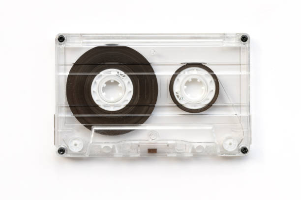 Transparent audio music cassette on white background - top view