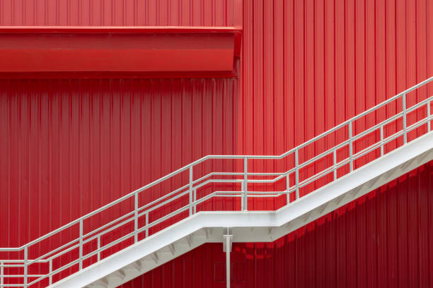 istock A red building with a white railing and a staircase 2164418925
