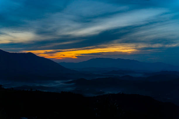 The birth of clouds. The fog rises and forms cirrus clouds in the sky. The highlands near Dalat in Vietnam.