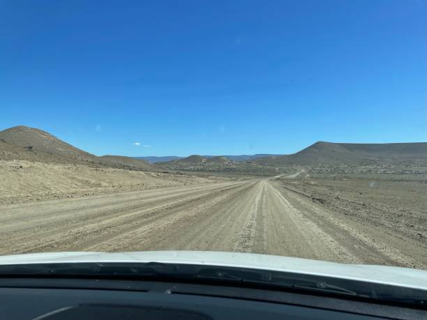 istock POV from passenger seat to road 2164419520