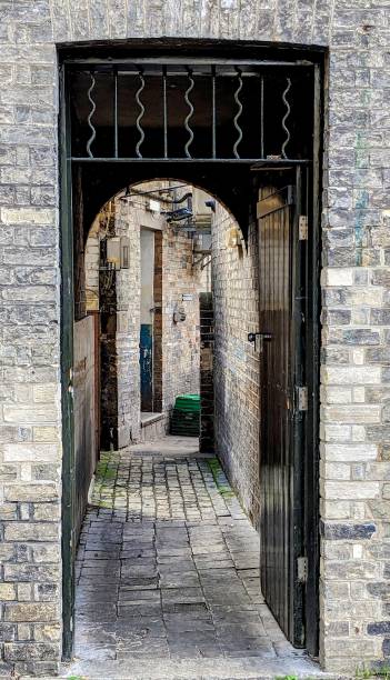 istock Medieval Gateway Arch in Cambridge Alleys 2164419670