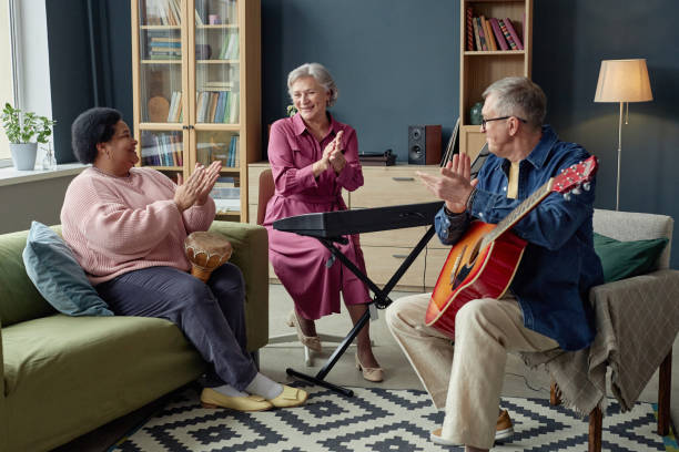 istock Group of Creative Mature People Playing Music 2164427155