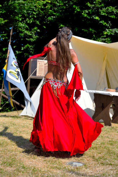 medieval show two days a thousand years ago in historical clothes woman performing belly dance 28 July 2024 Murazzano Italy