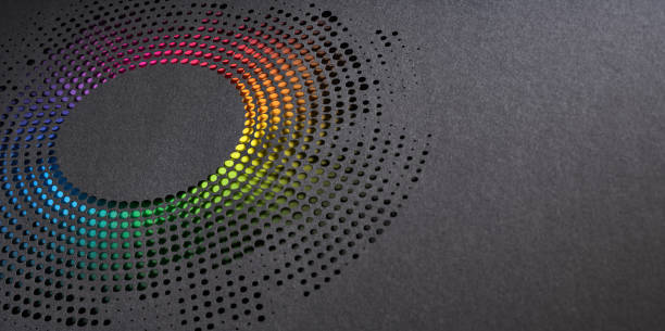 Native image size: 10632 x 5304. This elegant piece of paper art showcases a circular pattern of precisely cut holes arranged to form a mesmerizing radial design. The vibrant gradient of colors transitions seamlessly from red to violet, creating a stunning rainbow effect against the dark background. The meticulous craftsmanship and thoughtful use of color and negative space make this artwork an eye-catching and sophisticated composition, blending artistic creativity with geometric precision.