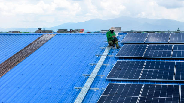 istock engineer man inspects construction of solar cell panel or photovoltaic cell by electronic device. Industrial Renewable energy of green power. factory worker working on tower roof. 2164429716