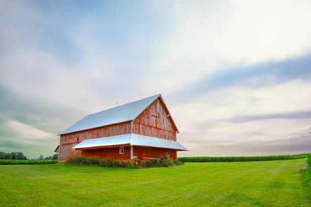 istock Old Red Barn with cornfield in the background-Tipton County, Indiana 2164430575