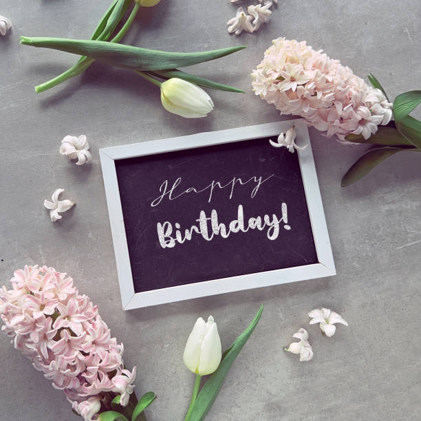 istock Spring Flowers and Happy Birthday Chalkboard 2164434639