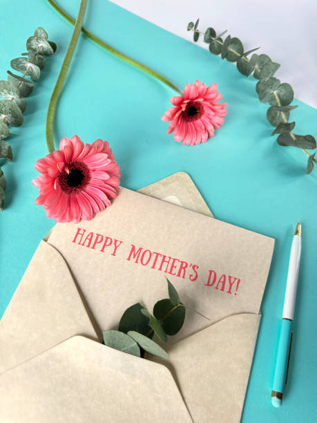 istock A Mothers Day Card With a Pink Gerbera Flower and Envelope 2164435976