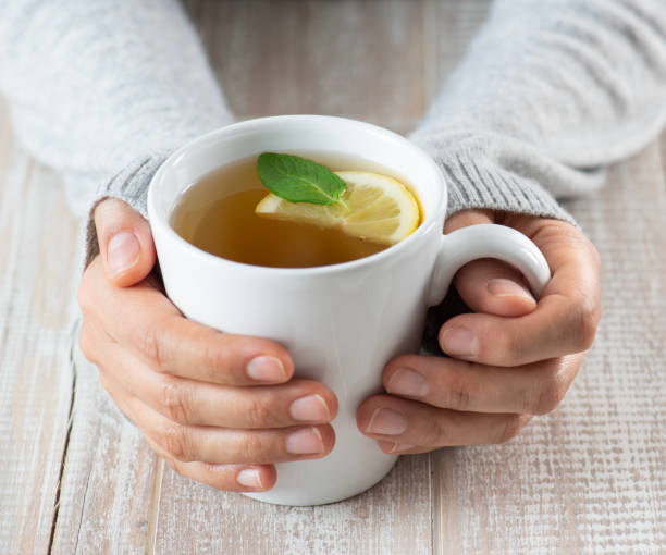 istock Woman With Tea 2164441512