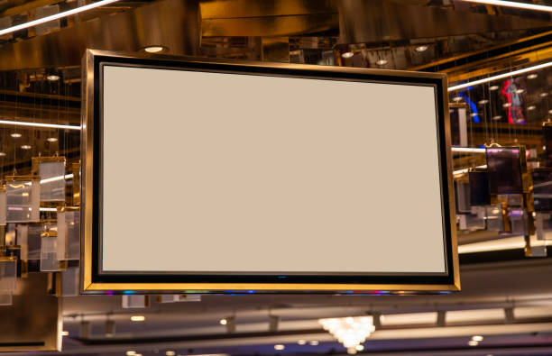 istock Golden Frame billboard inside shopping plaza empty mockup for your design 2164447049