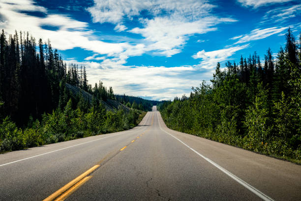 driving with a car on a mountain road in Alberta in Canada