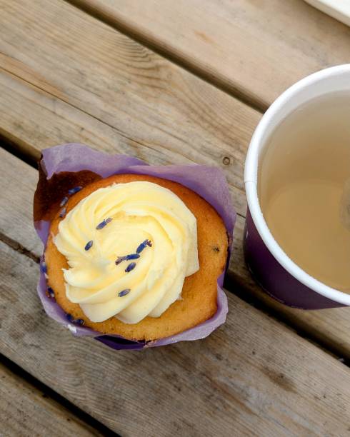 Lavender cupcake on the wooden table