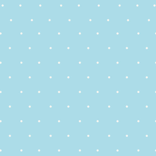 Seamless polka dot pattern with a blue and white color scheme. The design features evenly spaced white dots on a blue background. This pattern for textil, wallpaper, and digital background.