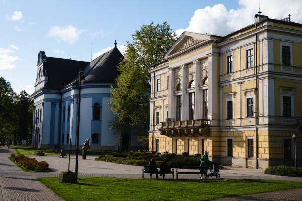 istock historic buildings in town park 2164469869