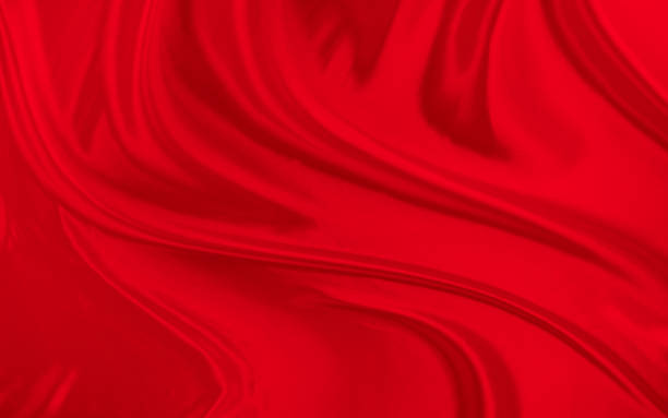 istock Black red satin dark fabric texture luxurious shiny that is abstract silk cloth background with patterns soft waves blur beautiful. 2164470877